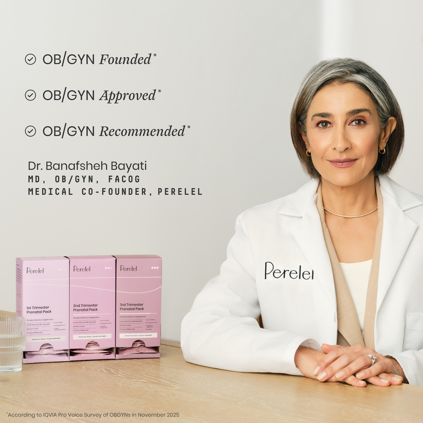 Woman in a white coat with 'Perelel' branding, surrounded by product boxes on a light background.